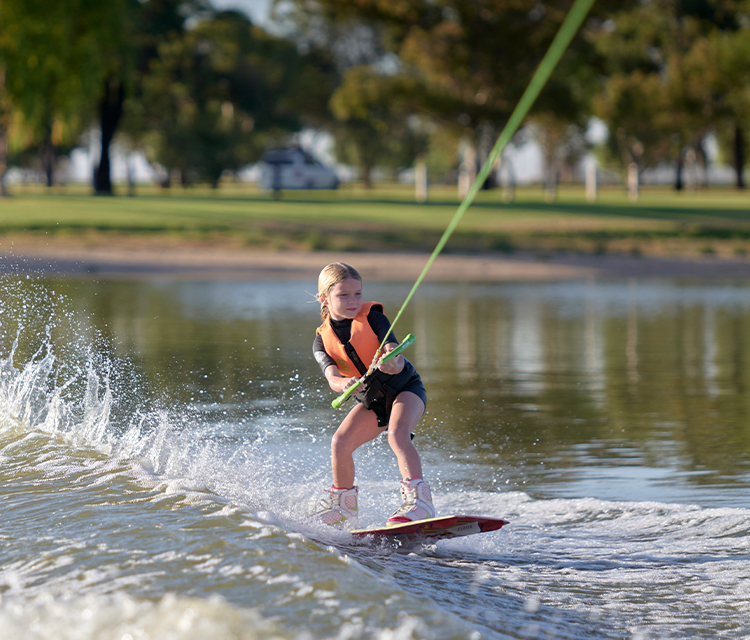 Young child wakeboarding